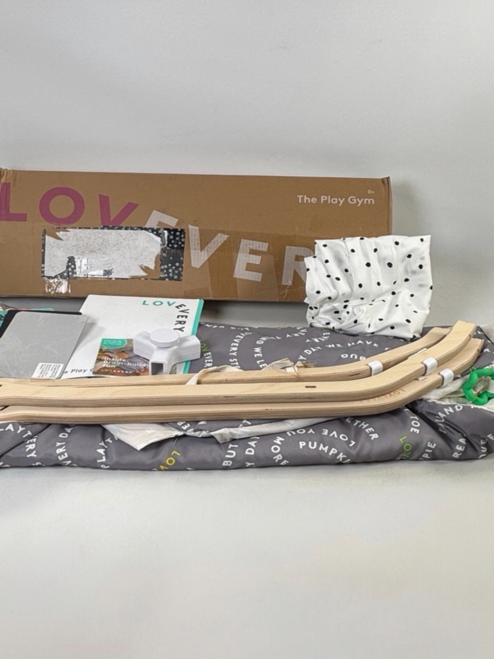 Lovevery Gray Play Gym with Natural Wood Frame